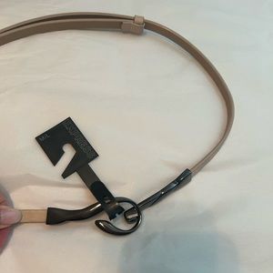 Express NWT beige belt with metal hook closure. Medium